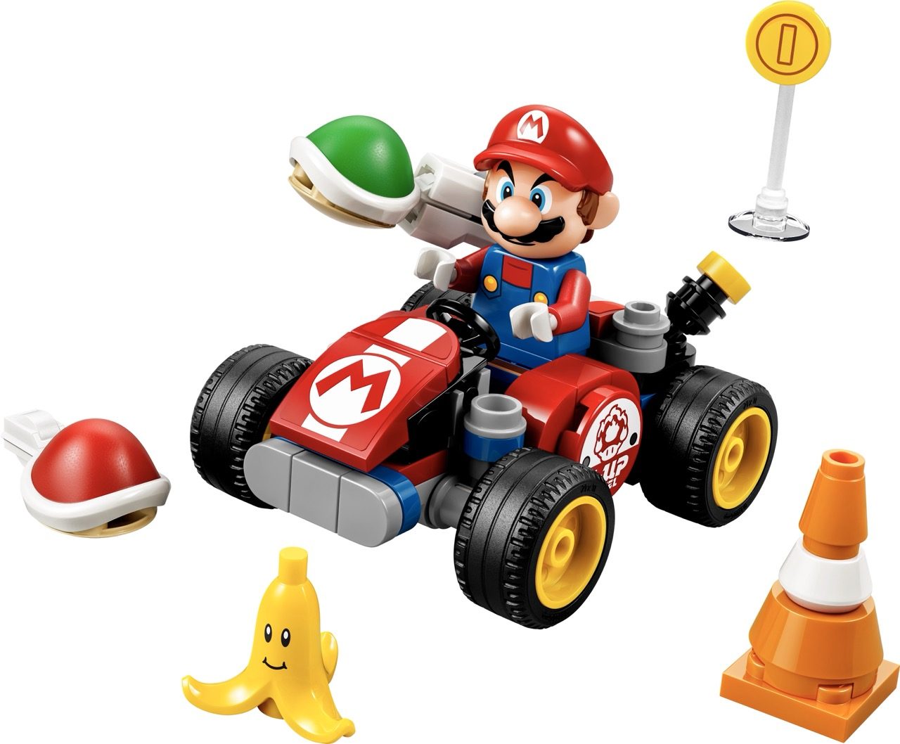 LEGO Super Mario kart set with Mario minifigure, red race car, green shell, banana, coin post, and traffic cones.