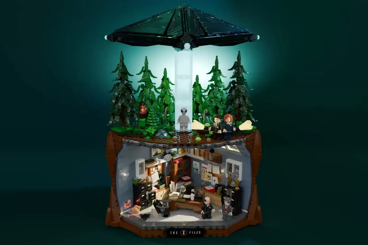 LEGO Ideas The X-Files set 21369 featuring UFO, forest scene, and FBI office with minifigures.