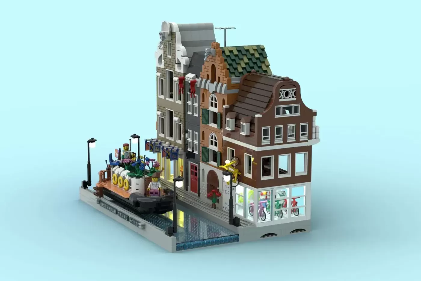 LEGO Amsterdam Canal Houses set with brick buildings, canal-side base, minifigures, and detailed architectural features.