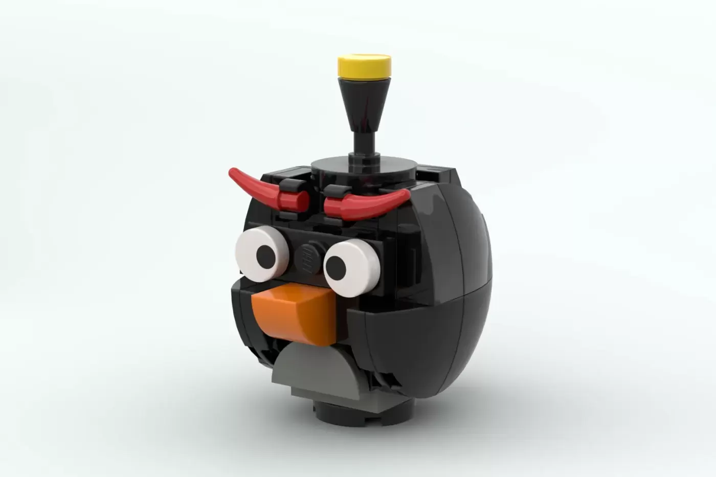 LEGO Angry Birds black bird character with orange beak, white eyes, red crown, and yellow launcher on top.