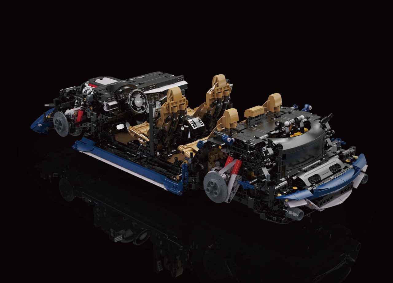 CaDA Audi RS6 LEGO set displayed with detailed engine components and tan interior seats against black background.