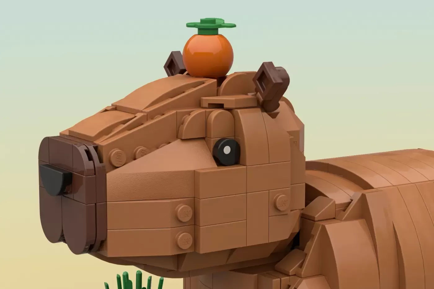 LEGO capybara MOC with brown brick body, orange fruit on head, and green leaf detail.