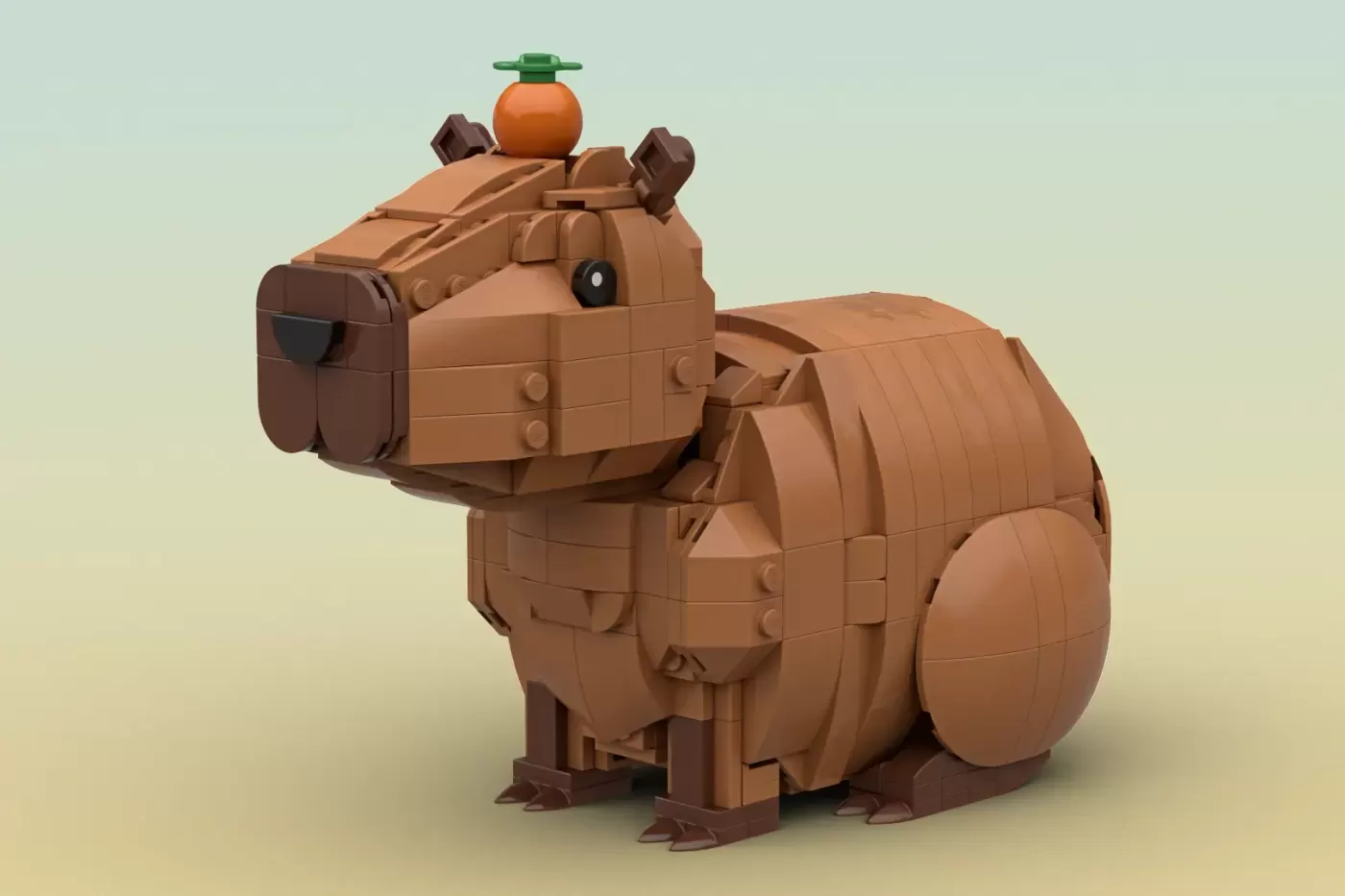 LEGO brick capybara in tan and brown with an orange fruit and green leaf on its head.