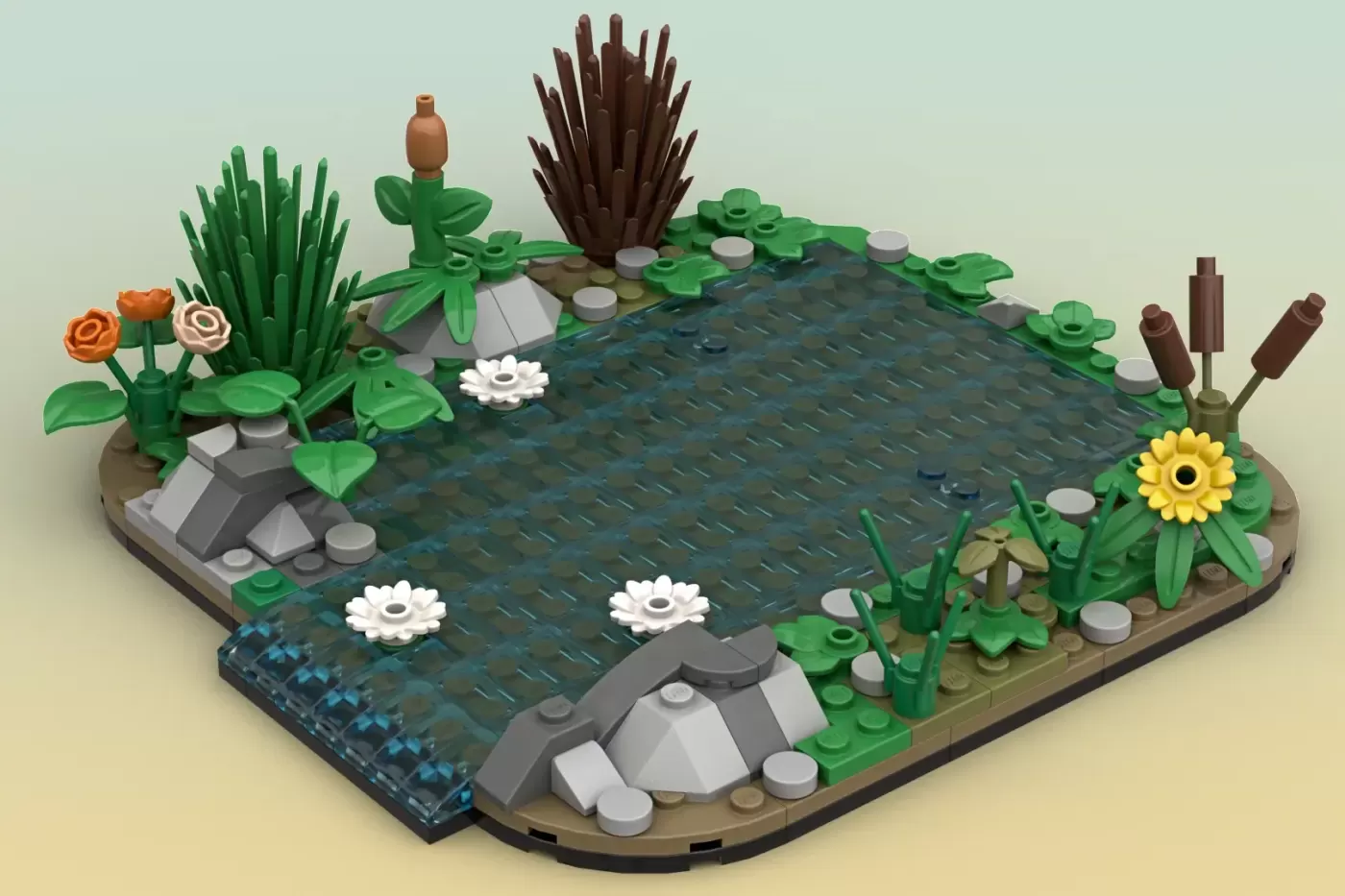 LEGO diorama of a pond ecosystem with water, surrounding plants, flowers, and rock formations in a natural landscape setting.