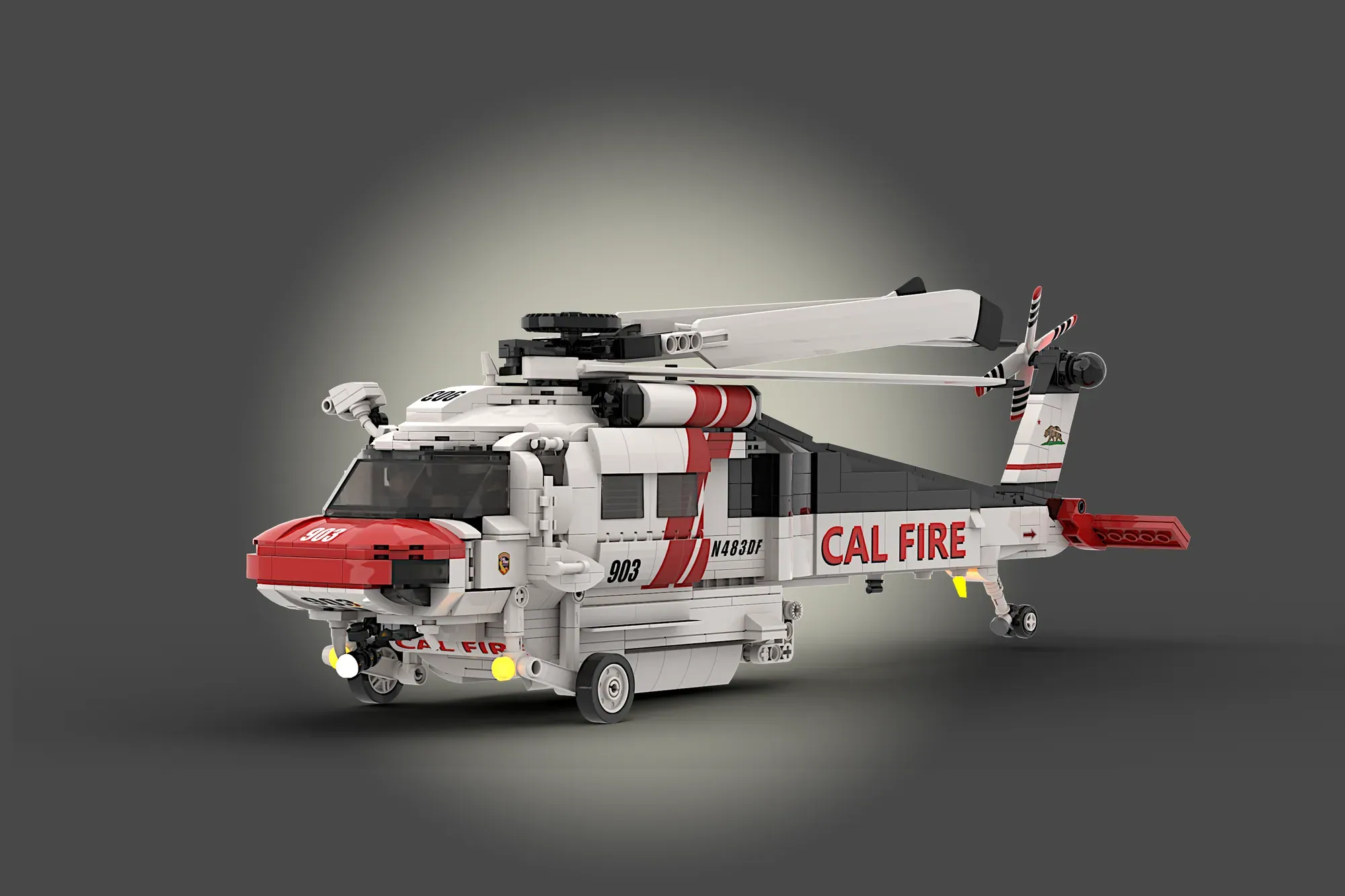 LEGO Firehawk helicopter with red and white California Fire livery, featuring detailed cockpit, rotors, and landing gear.