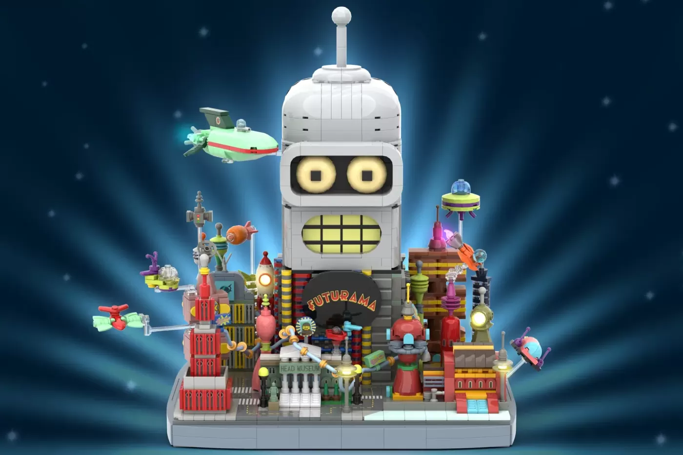 LEGO Futurama set featuring Bender's giant head with glowing eyes and Planet Express building with spacecraft and minifigu…