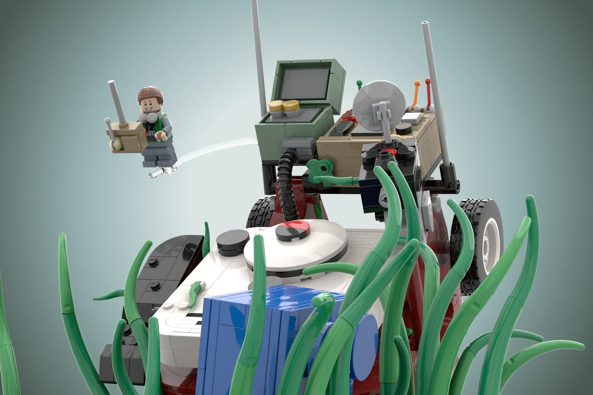 LEGO set depicting backyard scene from Honey I Shrunk the Kids with minifigure, oversized lawnmower, and giant grass blades.