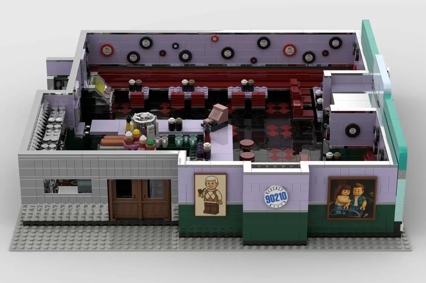 LEGO Ideas Peach Pit set with purple exterior, red seating area, kitchen counter, and detailed interior featuring minifigu…