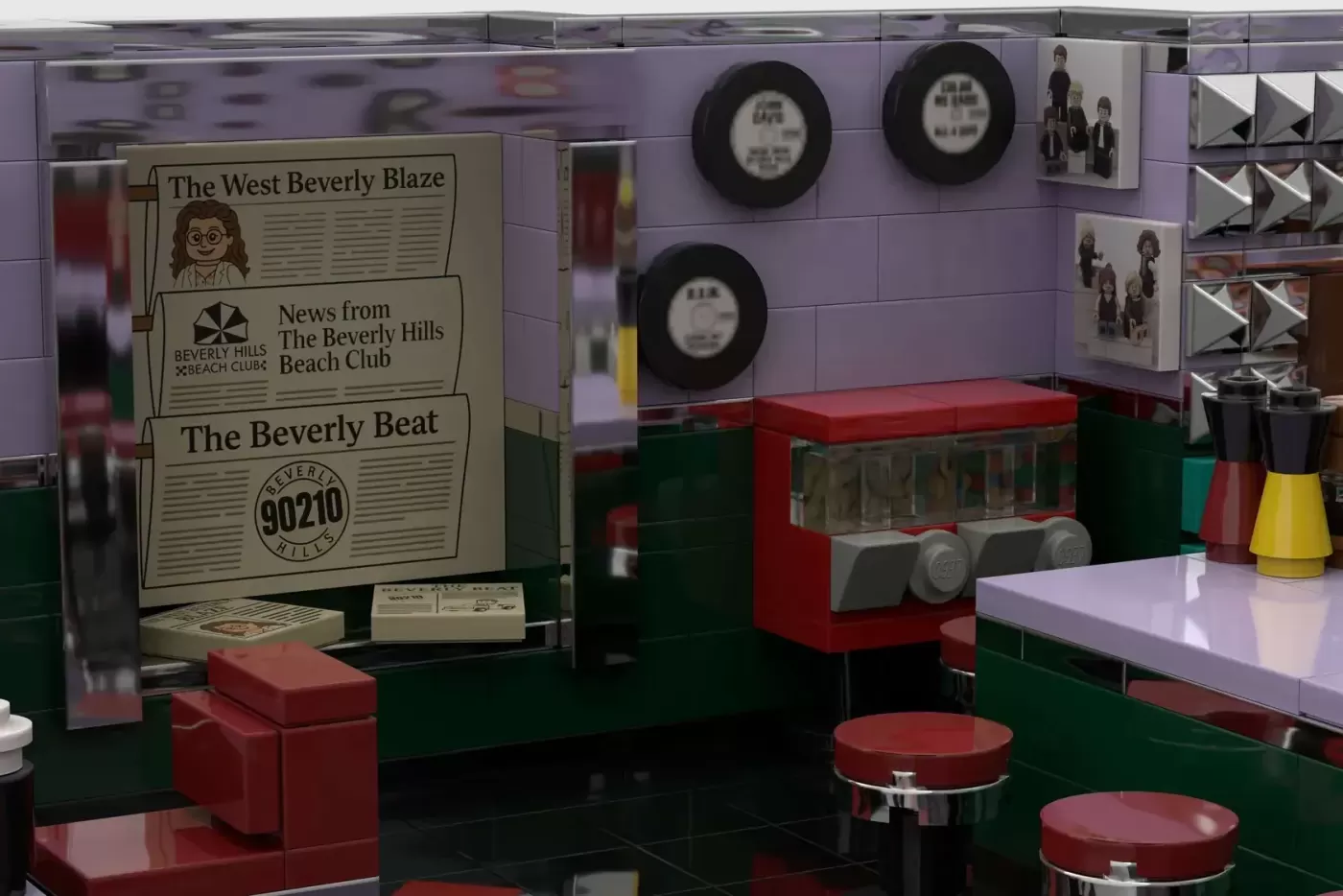 LEGO Peach Pit diner set with purple walls, red booths, newspapers, and circular clocks displayed.