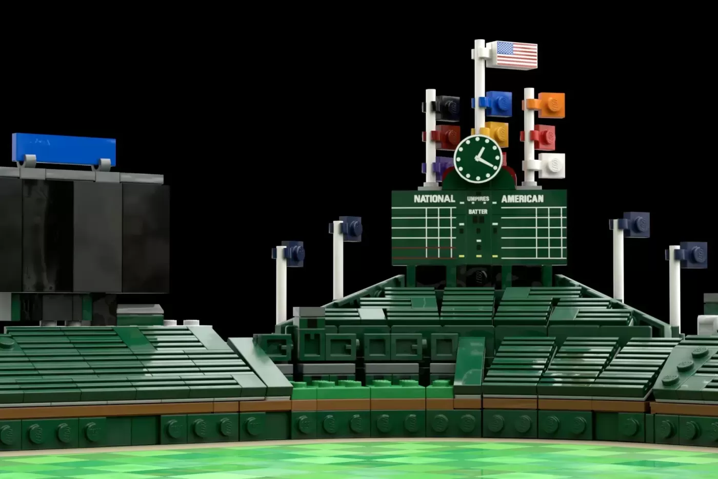 LEGO Wrigley Field scoreboard with green stands, clock, colored score flippers, and American flag.