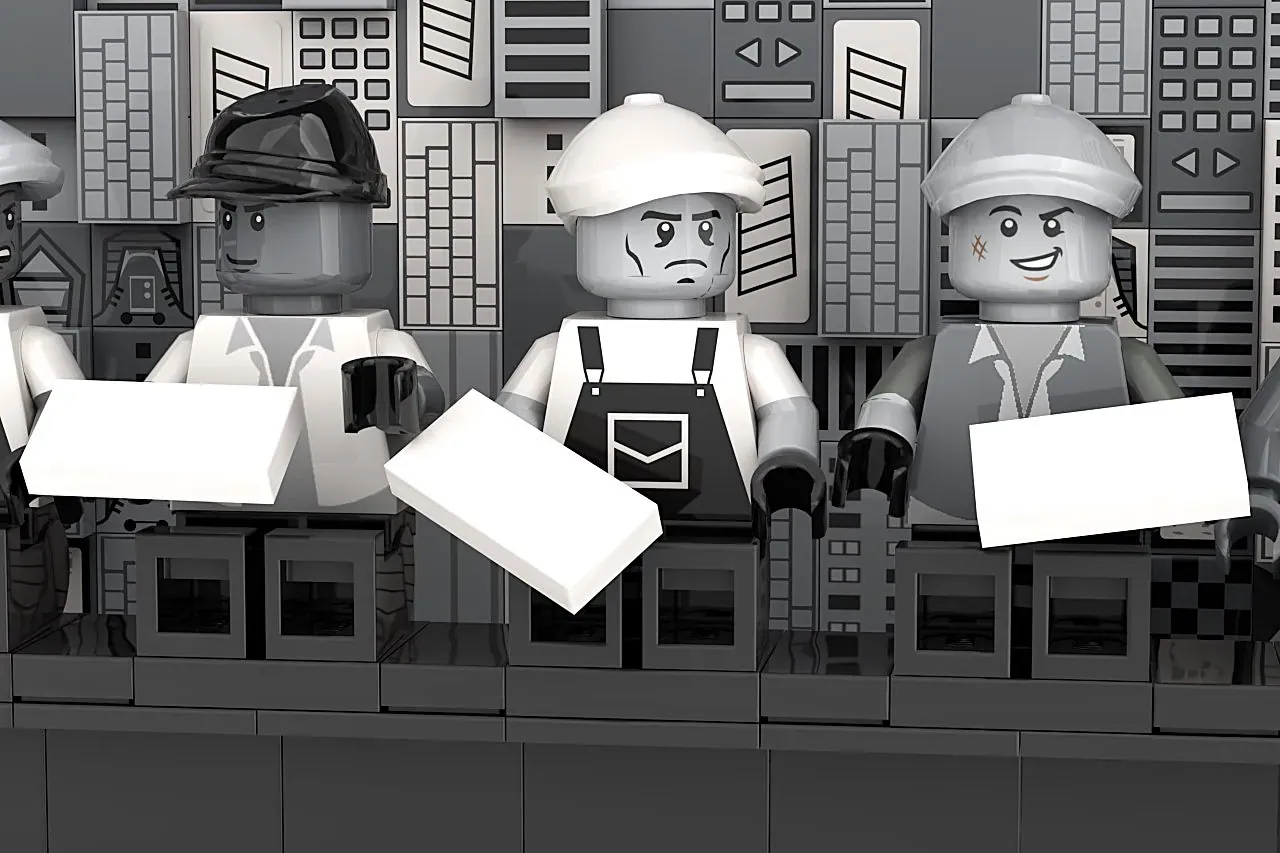 LEGO minifigures recreating the iconic lunch scene with blueprint plans on a high-rise building backdrop.