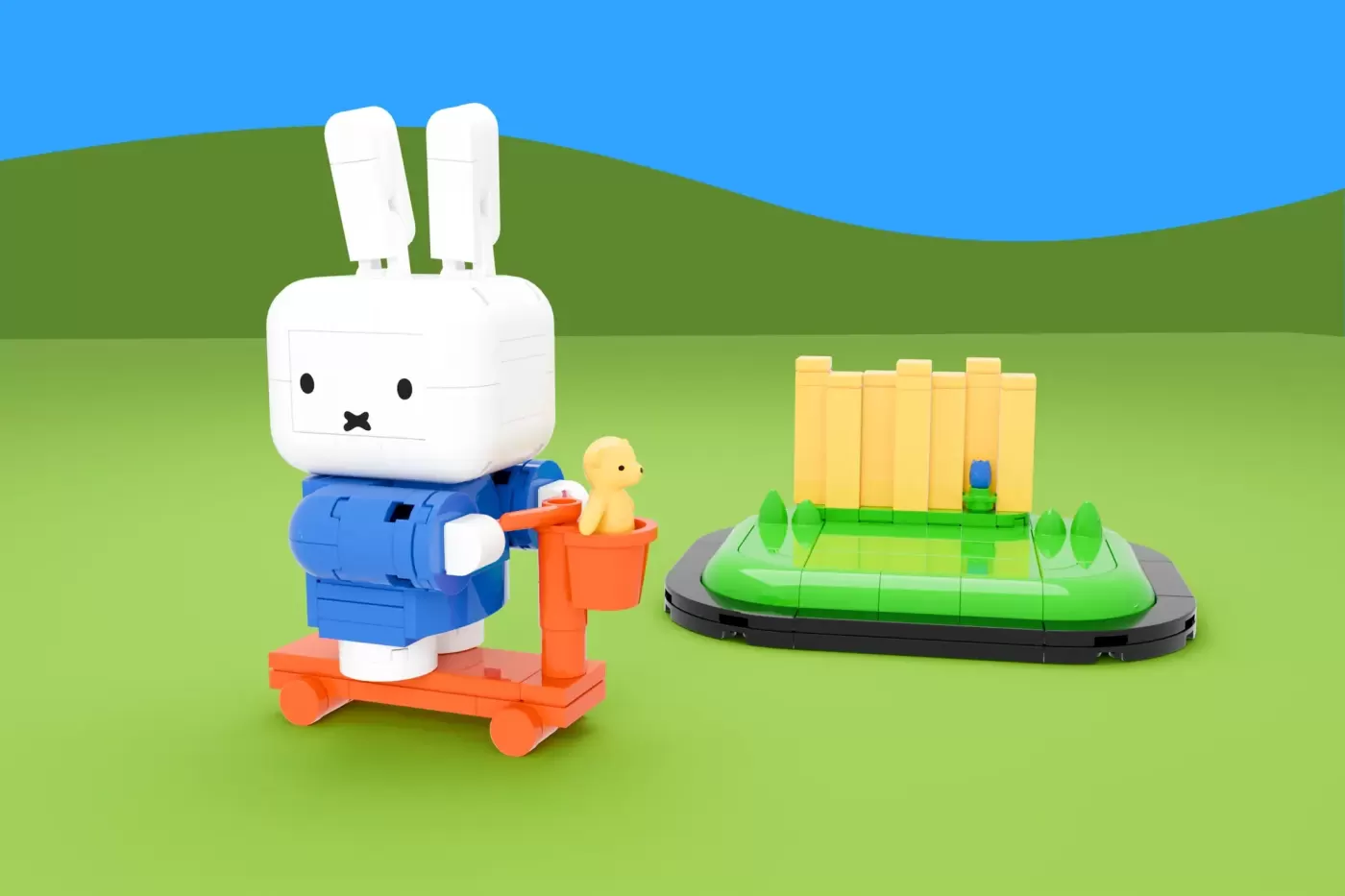 LEGO Miffy bunny figure on orange cart holding yellow duckling, with green fenced farm scene behind.