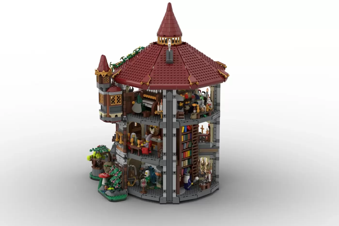 LEGO Wizards' Tower with red roof, multiple levels, minifigures, and detailed magical interior rooms and furnishings.