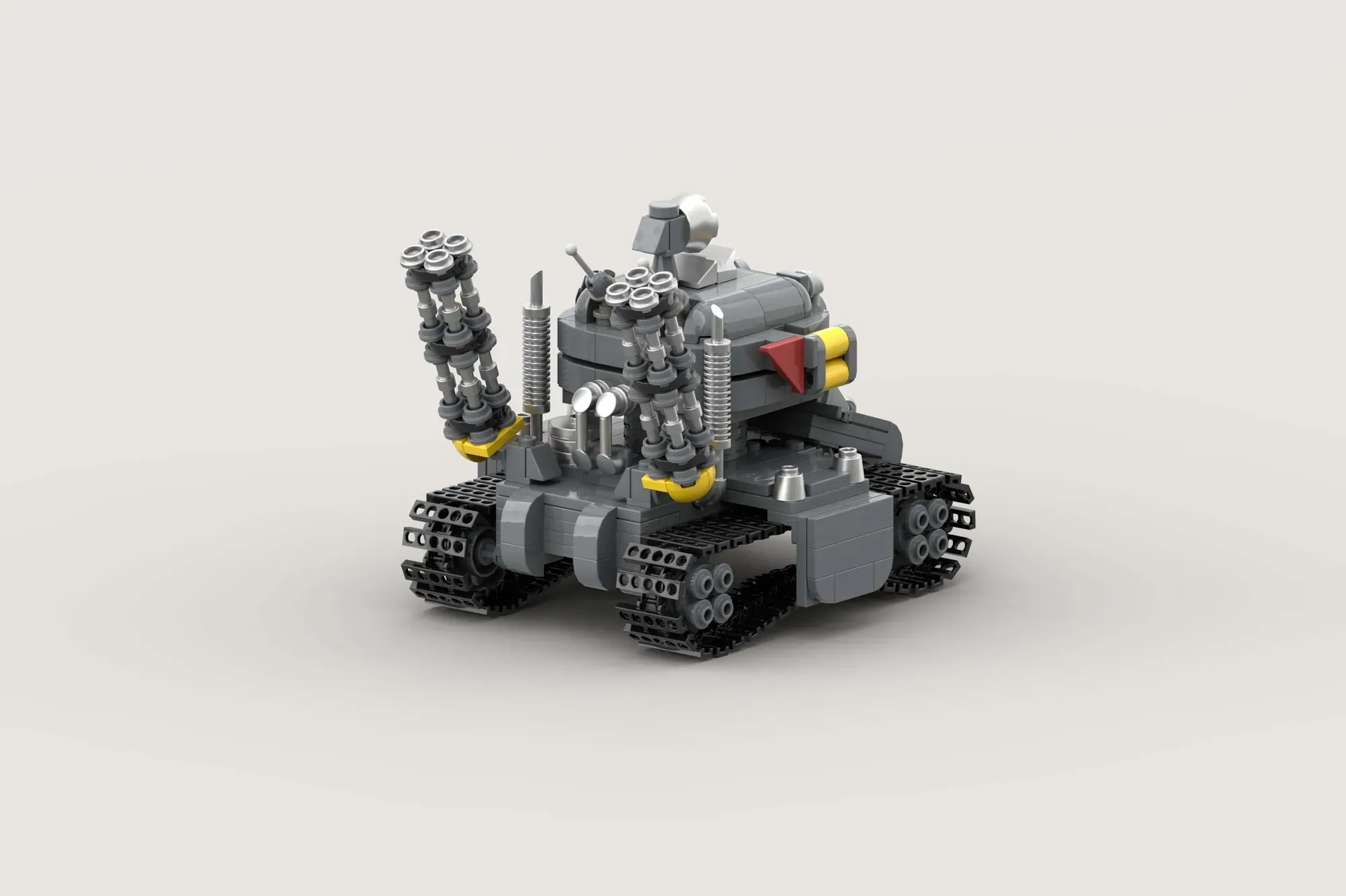 LEGO Metal Slug tank model with tracked treads, mounted weapons, and yellow and red accents on gray base.