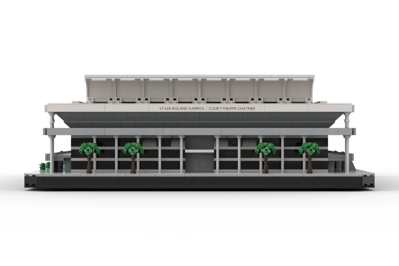 LEGO model of Philippe-Chatrier Court at Roland Garros with gray structure, palm trees, and spectator seating.