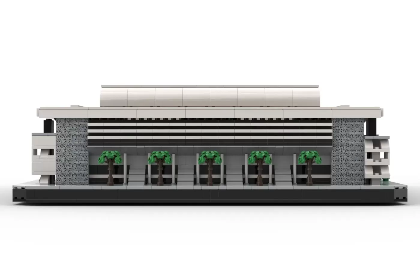LEGO model of Philippe-Chatrier Court with modern architecture, featuring five green trees and detailed facade elements.
