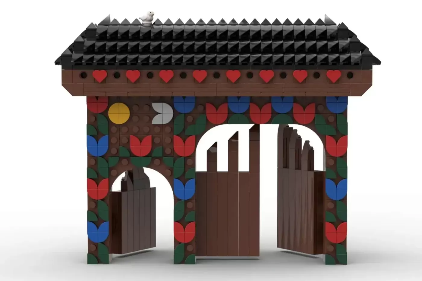 LEGO Szekler Gate model featuring ornate wooden doors, decorative red hearts, colorful tulips, and a black shingled roof.