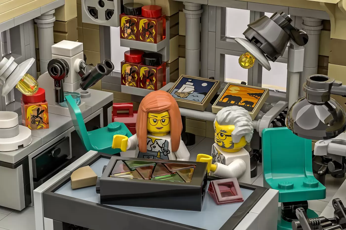 LEGO art gallery scene with two minifigures examining artwork on display table, surrounded by gallery fixtures and decor.
