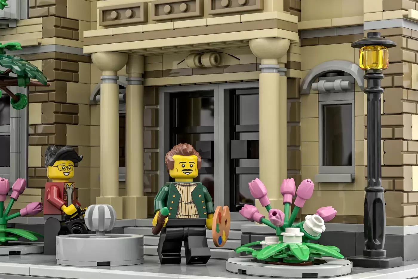 LEGO minifigures posed outside a neoclassical gallery facade with pink tulips, fountain, and street lamp.