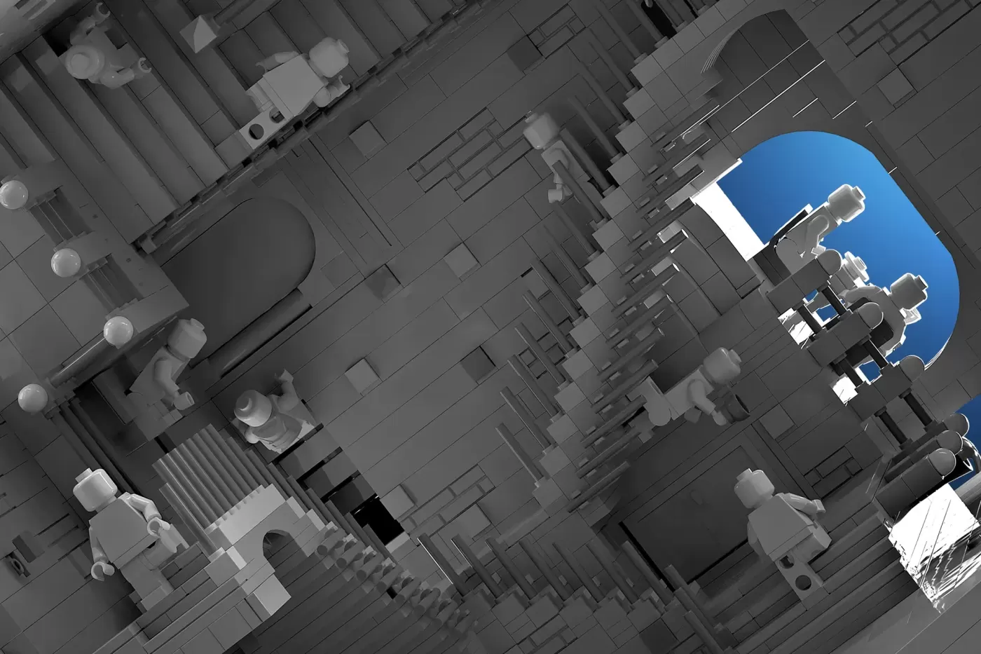 Overhead view of intricate LEGO build featuring Escher-inspired architecture with minifigures and detailed structural elem…
