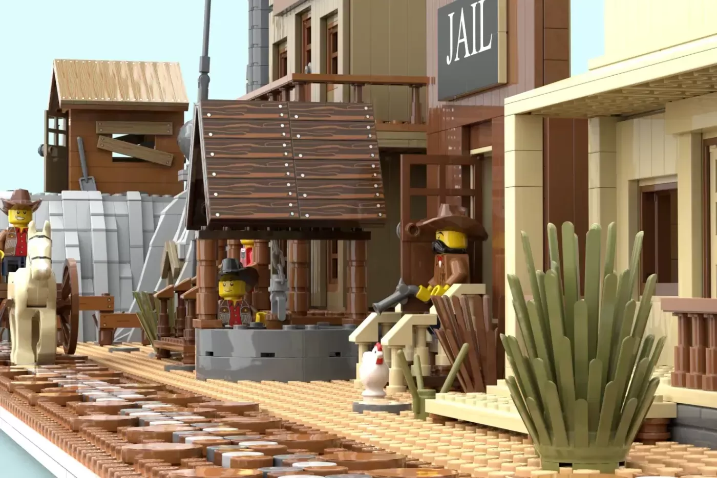 LEGO Old Western Town street scene with jail, minifigures, wooden buildings, cacti, and railroad tracks.
