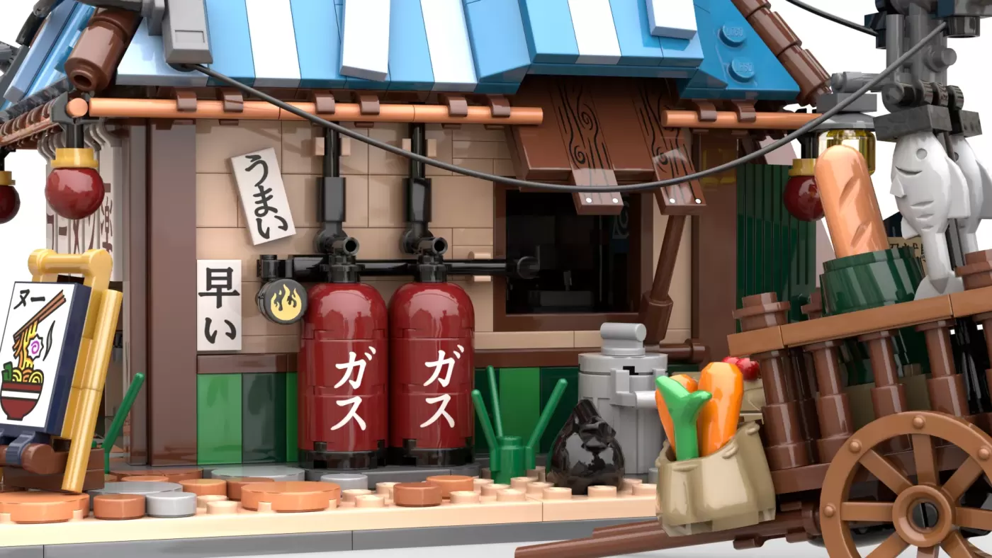 LEGO Ichiraku Ramen Shop with blue striped awning, red gas cylinders, wooden details, and fresh vegetables displayed outside.