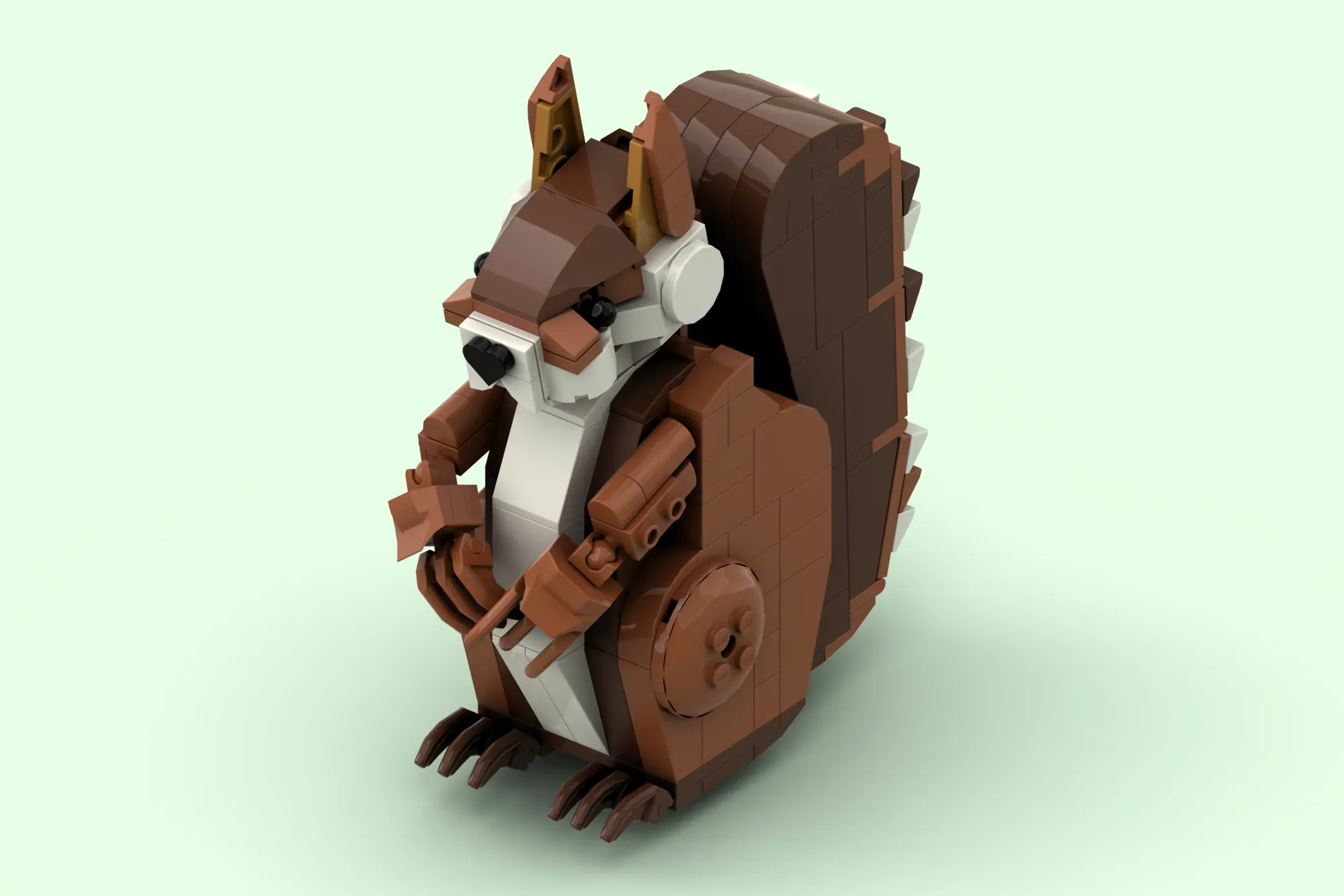 LEGO squirrel MOC with articulated limbs, brown and white coloring, holding acorn, standing pose.